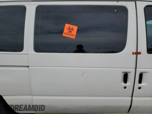 2002 Ford Econoline Passenger XL with VIN 1FMRE11242HB08362, listed as a Copart auction lot 43234805 with 117,626 mi miles and Salvage title. Bid and sale history available at DreamBid. Image 12.