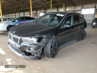 2018 BMW X1 sDrive28i with VIN WBXHU7C34J5L05725, listed as a Copart auction lot 49228475 with 69,994 mi miles and Salvage Title. Bid and sale history available at carsss.com. Image 1.