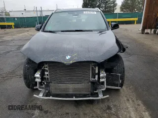 2021 BMW X1 xDrive28i z VIN WBXJG9C06M5T76049, wystawiony jako Copart lot #51816115 z przebiegiem 59 656 mil mil oraz Szkoda całkowita • Salvage title. Historia ofert i sprzedaży dostępna na DreamBid. Obrazek 5.