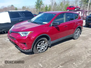 2018 Toyota RAV4 LE with VIN JTMBFREV2JD228186, listed as a IAAI auction lot 42076730 with 93,899 mi miles. Bid and sale history available at carsss.com. Image 2.