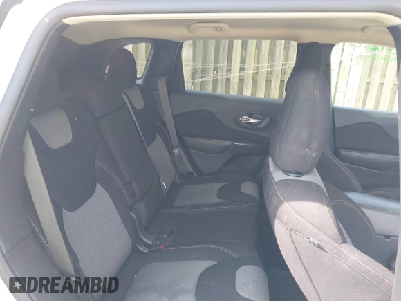 2016 Jeep Cherokee Altitude with VIN 1C4PJLAB9GW352580, listed as a IAAI auction lot 42044284 with 94,227 mi miles and . Bid and sale history available at DreamBid. Image 8.