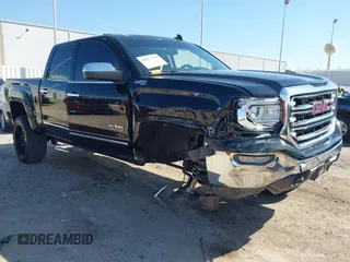 2017 GMC Sierra 1500 SLT z VIN 3GTU2NEC1HG385071, wystawiony jako IAAI lot #41877395 z przebiegiem 104 236 mil mil oraz . Historia ofert i sprzedaży dostępna na DreamBid. Obrazek 1.