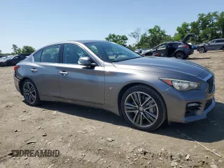 2015 Infiniti Q50 Premium with VIN JN1BV7AR6FM415389, listed as a Copart auction lot 61653845 with 124,141 mi miles and Salvage title. Bid and sale history available at DreamBid. Image 4.