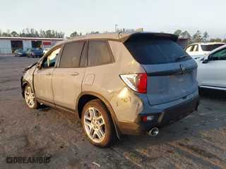 2024 Honda Passport EX-L with VIN 5FNYF8H5XRB017807, listed as a IAAI auction lot 41530820 with 5,797 mi miles. Bid and sale history available at carsss.com. Image 3.