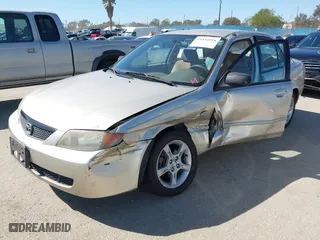 2003 Mazda Protege LX with VIN JM1BJ226330154838, listed as a IAAI auction lot 41854918 with NaN miles. Bid and sale history available at carsss.com. Image 21.