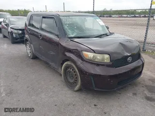 2010 Scion xB with VIN JTLZE4FE2A1117808, listed as a IAAI auction lot 41910113 with 242,060 mi miles. Bid and sale history available at carsss.com. Image 1.