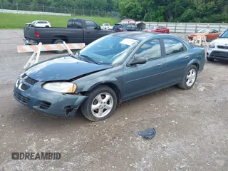 2006 Dodge Stratus SXT z VIN 1B3EL46R26N170271, wystawiony jako IAAI lot #42368788 z przebiegiem 134 937 mil mil oraz . Historia ofert i sprzedaży dostępna na DreamBid. Obrazek 2.