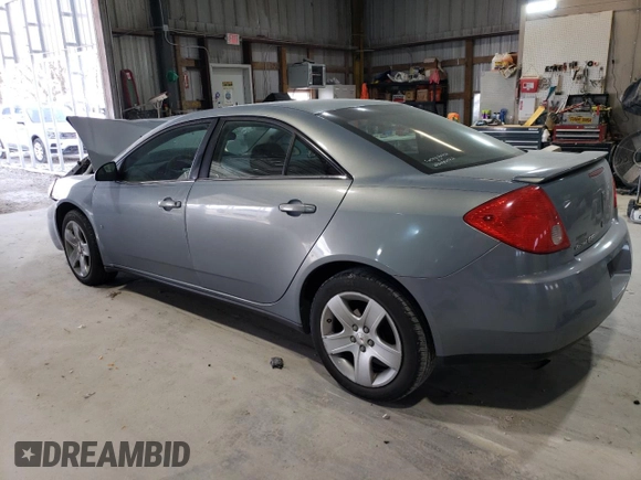 2009 Pontiac G6 1SA с VIN 1G2ZG57B594165849, выставлен на аукционе Copart как лот 49185795 с пробегом Не указан миль и Списание • Salvage title. История ставок и продаж доступна на DreamBid. Изображение 2.