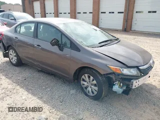 2012 Honda Civic LX with VIN 2HGFB2F57CH528266, listed as a IAAI auction lot 42094846 with 120,244 mi miles and . Bid and sale history available at DreamBid. Image 1.