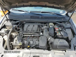 2013 Ford Taurus Limited z VIN 1FAHP2F81DG229944, wystawiony jako Copart lot #63218315 z przebiegiem 199 897 mil mil oraz Czysty tytuł • Clean title. Historia ofert i sprzedaży dostępna na DreamBid. Obrazek 11.