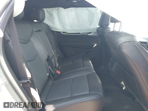 2025 Cadillac XT5 FWD Premium Luxury with VIN 1GYKNCRS1SZ120351, listed as a IAAI auction lot 41334881 with 4,915 mi miles. Bid and sale history available at carsss.com. Image 8.