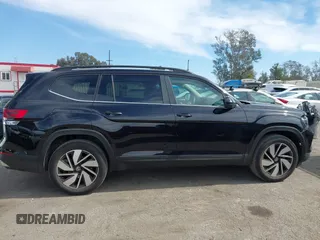 2024 Volkswagen Atlas SE z VIN 1V2JR2CAXRC512272, wystawiony jako IAAI lot #41642077 z przebiegiem 13 583 mil mil oraz . Historia ofert i sprzedaży dostępna na DreamBid. Obrazek 13.