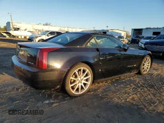 2006 Cadillac XLR z VIN 1G6YX36D965602114, wystawiony jako Copart lot #80151794 z przebiegiem Nie podano mil oraz Szkody całkowita. Historia ofert i sprzedaży dostępna na DreamBid. Obrazek 3.
