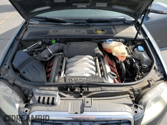 2007 Audi S4 z VIN WAUGL78E57A205295, wystawiony jako Copart lot #53499095 z przebiegiem 163 521 mil mil oraz Tytuł czysty. Historia ofert i sprzedaży dostępna na DreamBid. Obrazek 11.