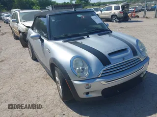 2006 MINI Convertible S with VIN WMWRH33596TK59633, listed as a IAAI auction lot 42242545 with 77,837 mi miles and . Bid and sale history available at DreamBid. Image 1.