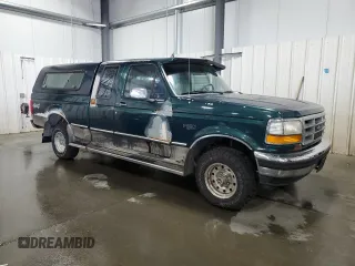 1994 Ford F-150 with VIN 1FTEX14N3RKB07414, listed as a Copart auction lot 70826944 with 130,998 mi miles and Salvage Title. Bid and sale history available at carsss.com. Image 4.