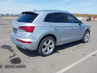 2021 Audi Q5 Premium Plus z VIN WA1BAAFY6M2130653, wystawiony jako IAAI lot #42138199 z przebiegiem 42 127 mil mil oraz . Historia ofert i sprzedaży dostępna na DreamBid. Obrazek 4.