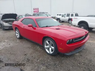 2013 Dodge Challenger R/T with VIN 2C3CDYBT5DH588006, listed as a IAAI auction lot 41858679 with 160,911 mi miles. Bid and sale history available at carsss.com. Image 1.