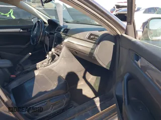 2015 Volkswagen Passat S with VIN 1VWAS7A38FC116213, listed as a IAAI auction lot 41749385 with 169,599 mi miles and . Bid and sale history available at DreamBid. Image 5.
