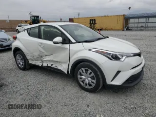 2019 Toyota C-HR XLE with VIN JTNKHMBX9K1059561, listed as a Copart auction lot 53568795 with 58,912 mi miles and Salvage Title. Bid and sale history available at DreamBid. Image 4.