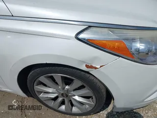 2014 Hyundai Azera Limited z VIN KMHFH4JG2EA373608, wystawiony jako IAAI lot #42125063 z przebiegiem 121 111 mil mil oraz . Historia ofert i sprzedaży dostępna na DreamBid. Obrazek 6.