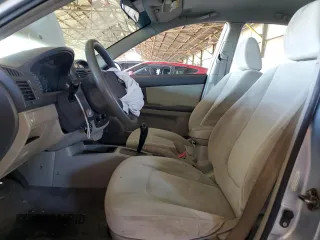 2006 Kia Spectra EX with VIN KNAFE121465332510, listed as a Copart auction lot 77211974 with 148,964 mi miles and Salvage Title. Bid and sale history available at carsss.com. Image 7.