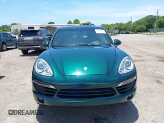 2014 Porsche Cayenne with VIN WP1AA2A21ELA06570, listed as a IAAI auction lot 42473298 with 61,421 mi miles and . Bid and sale history available at DreamBid. Image 13.
