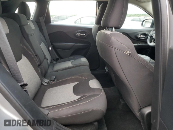 2015 Jeep Cherokee Sport z VIN 1C4PJLAB1FW711631, wystawiony jako Copart lot #58373145 z przebiegiem 123 683 mil mil oraz Szkoda całkowita • Salvage title. Historia ofert i sprzedaży dostępna na DreamBid. Obrazek 11.