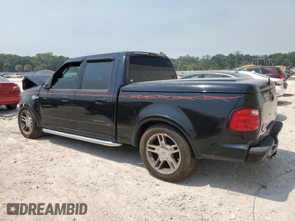2002 Ford F-150 Harley Davidson with VIN 1FTRW07312KC64714, listed as a Copart auction lot 51275124 with 198,826 mi miles and Non Repairable. Bid and sale history available at carsss.com. Image 2.