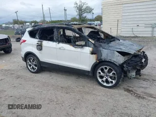 2015 Ford Escape Titanium with VIN 1FMCU0JX1FUB05026, listed as a IAAI auction lot 41663887 with 1 mi miles. Bid and sale history available at carsss.com. Image 1.