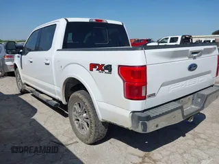 2019 Ford F-150 XL with VIN 1FTEW1E55KKC16805, listed as a IAAI auction lot 42060149 with 173,090 mi miles. Bid and sale history available at carsss.com. Image 3.