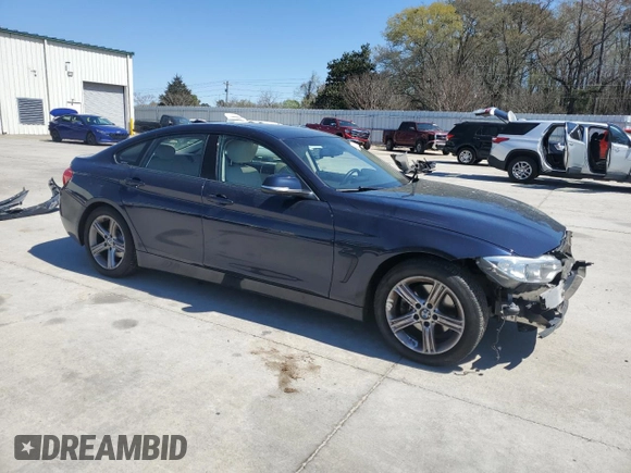 2015 BMW 4 Series 428i with VIN WBA4A5C53FGK15503, listed as a Copart auction lot 49297895 with 125,055 mi miles and Salvage title. Bid and sale history available at DreamBid. Image 4.