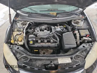 2002 Dodge Stratus SE z VIN 1B3EL36R02N198011, wystawiony jako Copart lot #58213505 z przebiegiem 104 464 mil mil oraz Tytuł czysty. Historia ofert i sprzedaży dostępna na DreamBid. Obrazek 11.