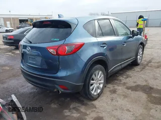 2014 Mazda CX-5 Grand Touring with VIN JM3KE4DYXE0403192, listed as a IAAI auction lot 41828016 with 156,270 mi miles and . Bid and sale history available at carsss.com. Image 4.
