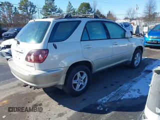 1999 Lexus RX 300 Luxury SUV with VIN JT6HF10U3X0052413, listed as a IAAI auction lot 41404927 with 211,660 mi miles. Bid and sale history available at carsss.com. Image 4.
