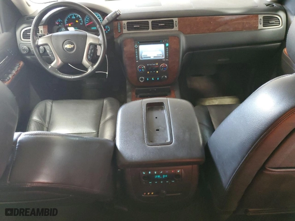 2012 Chevrolet Suburban LTZ with VIN 1GNSKKE74CR325522, listed as a Copart auction lot 52215745 with 214,973 mi miles and Clean Title. Bid and sale history available at carsss.com. Image 8.