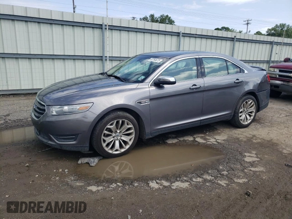 2014 Ford Taurus Limited with VIN 1FAHP2F84EG149622, listed as a Copart auction lot 63764675 with 208,801 mi miles and Salvage title. Bid and sale history available at DreamBid. Image 1.