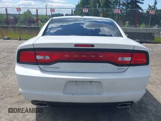 2014 Dodge Charger SXT z VIN 2C3CDXHG6EH267131, wystawiony jako IAAI lot #42321246 z przebiegiem 95 385 mil mil oraz . Historia ofert i sprzedaży dostępna na DreamBid. Obrazek 17.