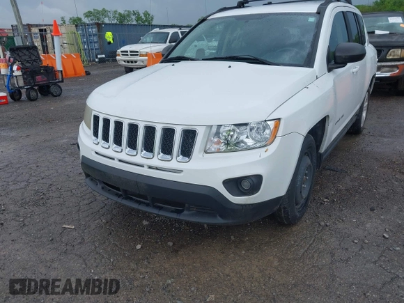 2011 Jeep Compass Latitude with VIN 1J4NT1FB1BD192076, listed as a IAAI auction lot 42121930 with 148,548 mi miles. Bid and sale history available at carsss.com. Image 6.
