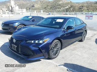 2021 Toyota Avalon Hybrid XSE z VIN 4T1EA1AB3MU005275, wystawiony jako IAAI lot #42335546 z przebiegiem 46 524 mil mil oraz . Historia ofert i sprzedaży dostępna na DreamBid. Obrazek 17.