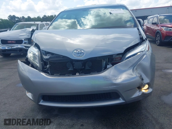 2015 Toyota Sienna XLE with VIN 5TDYK3DC5FS685735, listed as a IAAI auction lot 42139229 with 87,694 mi miles and . Bid and sale history available at DreamBid. Image 6.