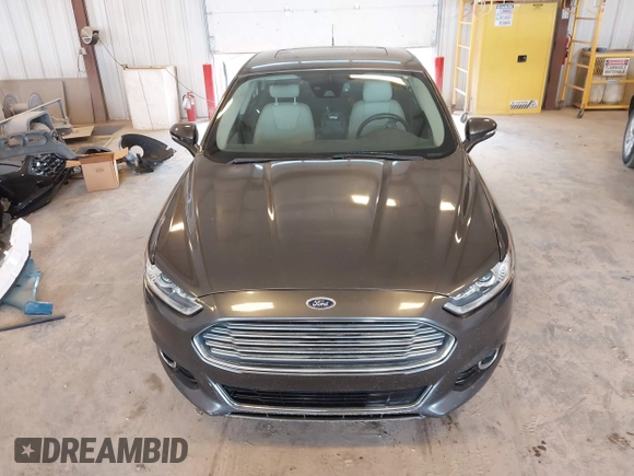 2016 Ford Fusion Titanium with VIN 3FA6P0D9XGR223354, listed as a IAAI auction lot 42621924 with Not provided miles and . Bid and sale history available at DreamBid. Image 6.