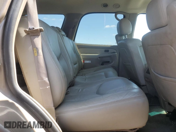 2003 Chevrolet Tahoe LT z VIN 1GNEK13Z43J136234, wystawiony jako Copart lot #51245445 z przebiegiem 227 769 mil mil oraz Czysty tytuł • Clean title. Historia ofert i sprzedaży dostępna na DreamBid. Obrazek 11.