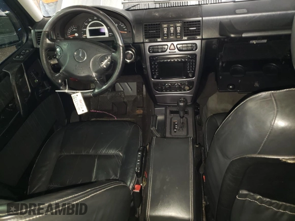 2005 Mercedes-Benz G with VIN WDCYR71E65X160243, listed as a Copart auction lot 48140075 with 164,457 mi miles and Salvage Title. Bid and sale history available at DreamBid. Image 8.