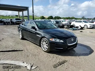 2015 Jaguar XJ with VIN SAJWA1CZXF8V81218, listed as a Copart auction lot 76613434 with 56,549 mi miles and Salvage Title. Bid and sale history available at carsss.com. Image 14.