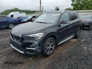 2018 BMW X1 xDrive28i z VIN WBXHT3C39J5L34133, wystawiony jako Copart lot #60195805 z przebiegiem 49 551 mil mil oraz Szkoda całkowita • Salvage title. Historia ofert i sprzedaży dostępna na DreamBid. Obrazek 1.