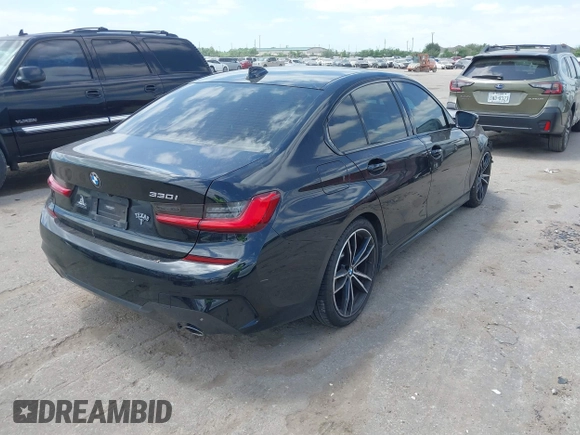 2021 BMW 3 Series 330i with VIN 3MW5R1J02M8B50832, listed as a IAAI auction lot 42032570 with 70,534 mi miles and . Bid and sale history available at DreamBid. Image 4.