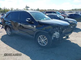 2014 Kia Sorento LX with VIN 5XYKT4A69EG468157, listed as a IAAI auction lot 41771810 with 144,214 mi miles. Bid and sale history available at carsss.com. Image 1.