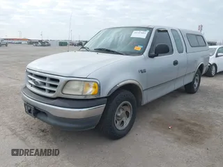 1999 Ford F-150 with VIN 1FTZX1720XKA10512, listed as a IAAI auction lot 41247083 with 169,154 mi miles and . Bid and sale history available at DreamBid. Image 2.