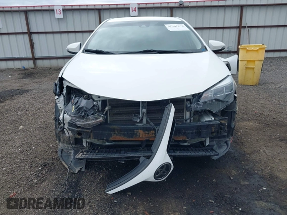 2019 Toyota Corolla L with VIN 5YFBURHE1KP937059, listed as a IAAI auction lot 41901278 with 98,796 mi miles and . Bid and sale history available at DreamBid. Image 13.